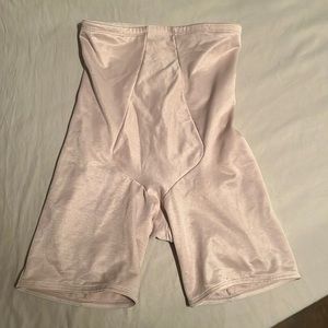 Under score body shaper. Elastic around top and legs. Extra tummy control